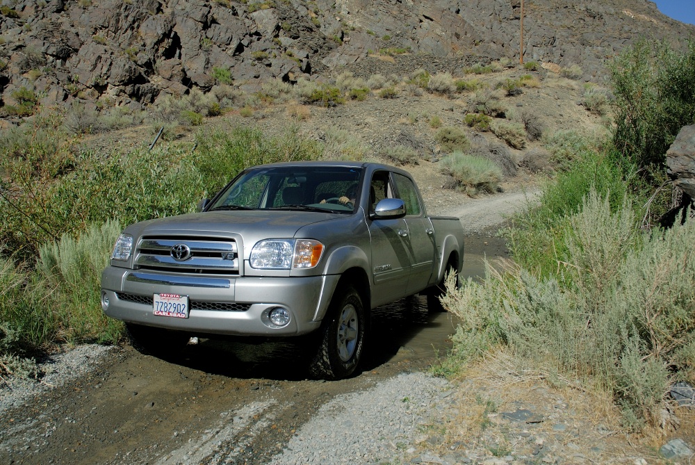 LC fording stream on jeep road from Bristlecone forest to Bishop 8-3-06