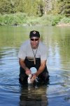 Steve cleaning fish in Lake Mary at Mammoth-5 8-1-06