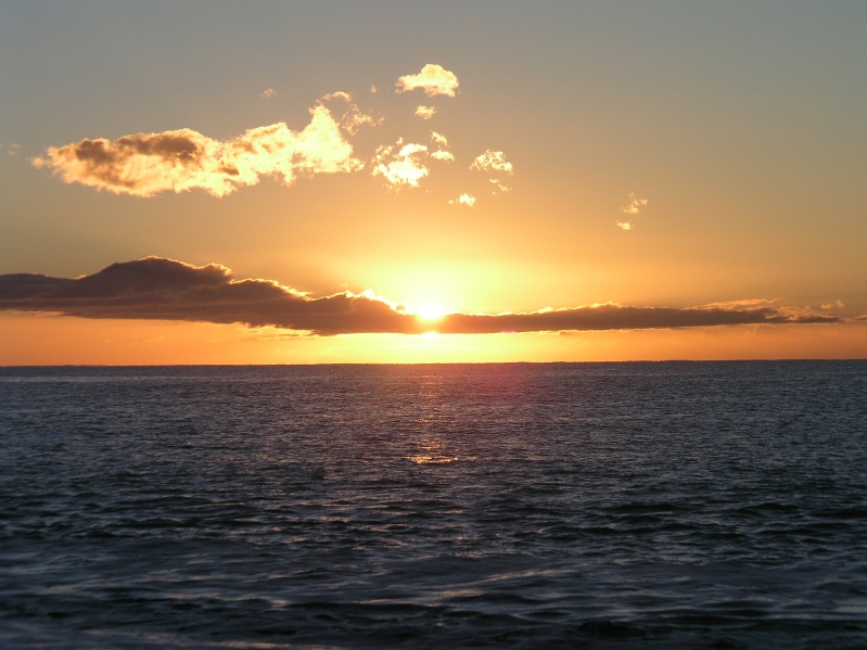 GK Sun rising at Kaikoura beach in NZ 6-25-03